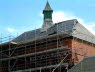 Roof slates being replaced