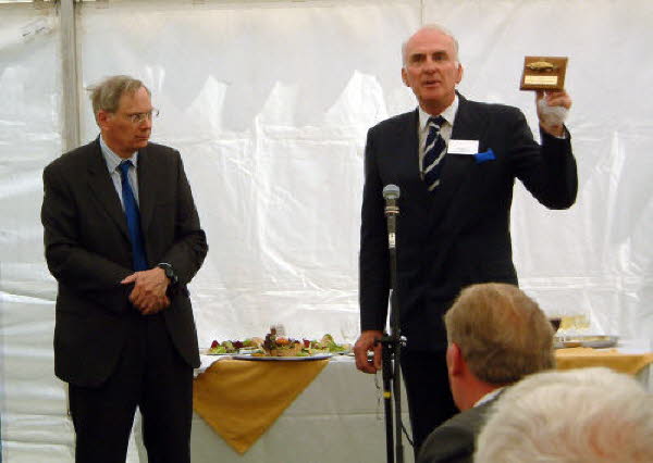 Geoffrey Bond presenting a plaque