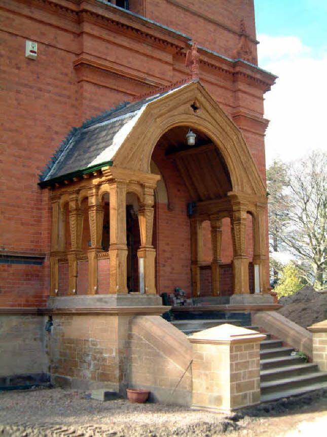 The almost finished porch, the light brown colour on the timbers is a