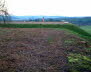 Looking across the cleared top of the old reservoir