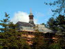 View of roof with new slates on lower & right side. 